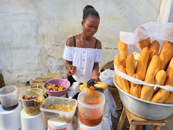 Goûtez Cotonou au lever du jour avec un guide local